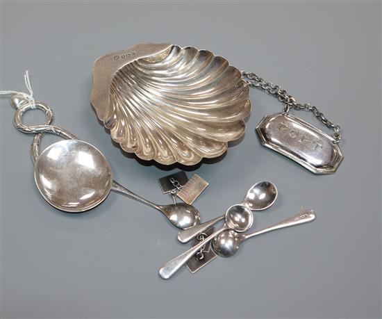 A late Victorian silver butter shell, Sheffield, 1897 and other small items including Italian 800 spoon, pair of white metal cufflinks.